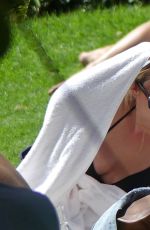 ASHLEY BENSON in Bikini at a Pool in Miami 07/03/2017