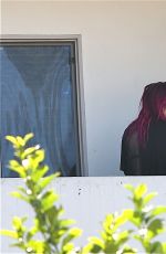 BELLA THORNE and Her Boyfriend Blackbear on the Balcony of Their Hotel in Los Angeles 07/20/2017