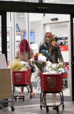 BELLA THORNE in Pink Flamingo Slippers Shopping at Michael