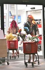 BELLA THORNE in Pink Flamingo Slippers Shopping at Michael