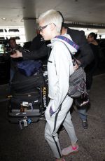 CARA DELEVINGNE Arrives at LAX Airport in Los Angeles 07/15/2017