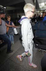 CARA DELEVINGNE Arrives at LAX Airport in Los Angeles 07/15/2017