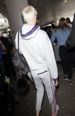 CARA DELEVINGNE Arrives at LAX Airport in Los Angeles 07/15/2017