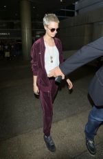 CARA DELEVINGNE Arrives at LAX Airport in Los Angeles 07/29/2017