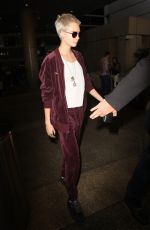 CARA DELEVINGNE Arrives at LAX Airport in Los Angeles 07/29/2017