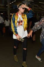 CARA DELEVINGNE Arrives in London 07/07/2017