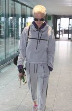 CARA DELEVINGNE at Heathrow Airport in London 07/15/2017