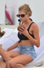 CHARLOTTE MCKINNEY in Bikini Top oat a Beach in Miami 07/22/2017