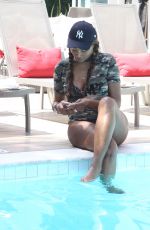 CYNTHIA BAILEY at a Pool in Los Angeles 07/11/2017