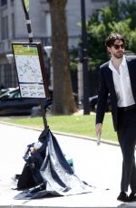 ELIZABETH OLSEN Looking for a Cab in Paris 07/03/2017