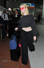ELLE FANNING at Charles De Gaulle Airport in Paris 07/01/2017