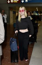 ELLE FANNING at Charles De Gaulle Airport in Paris 07/01/2017