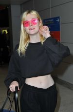 ELLE FANNING at Charles De Gaulle Airport in Paris 07/01/2017