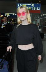 ELLE FANNING at Charles De Gaulle Airport in Paris 07/01/2017