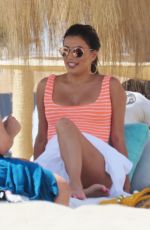 EVA LONGORIA in Swimsuit on Sunbed at a Beach in Marbella 07/13/2017