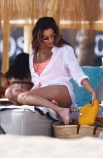 EVA LONGORIA in Swimsuit on Sunbed at a Beach in Marbella 07/13/2017