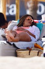 EVA LONGORIA in Swimsuit on Sunbed at a Beach in Marbella 07/13/2017