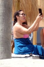 EVA LONGORIA in Swimsuit on Sunbed at a Beach in Marbella 07/13/2017