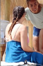 EVA LONGORIA in Swimsuit on Sunbed at a Beach in Marbella 07/13/2017