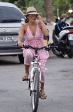 EVA LONGORIA Riding a Bike in Marbella 07/18/2017