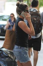 JENNIFER ANISTON Talking on Her Phone Out in New York 07/18/2017