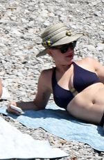 KATY PERRY in Bikini Paddleboarding in Italy 07/13/2017