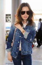LILY COLLINS at Los Angeles International Airport 07/13/2017
