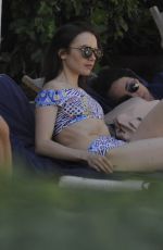 LILY COLLINS in Bikini at a Beach in Ischia 07/16/2017