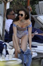 LILY COLLINS in Bikini at a Beach in Ischia 07/16/2017