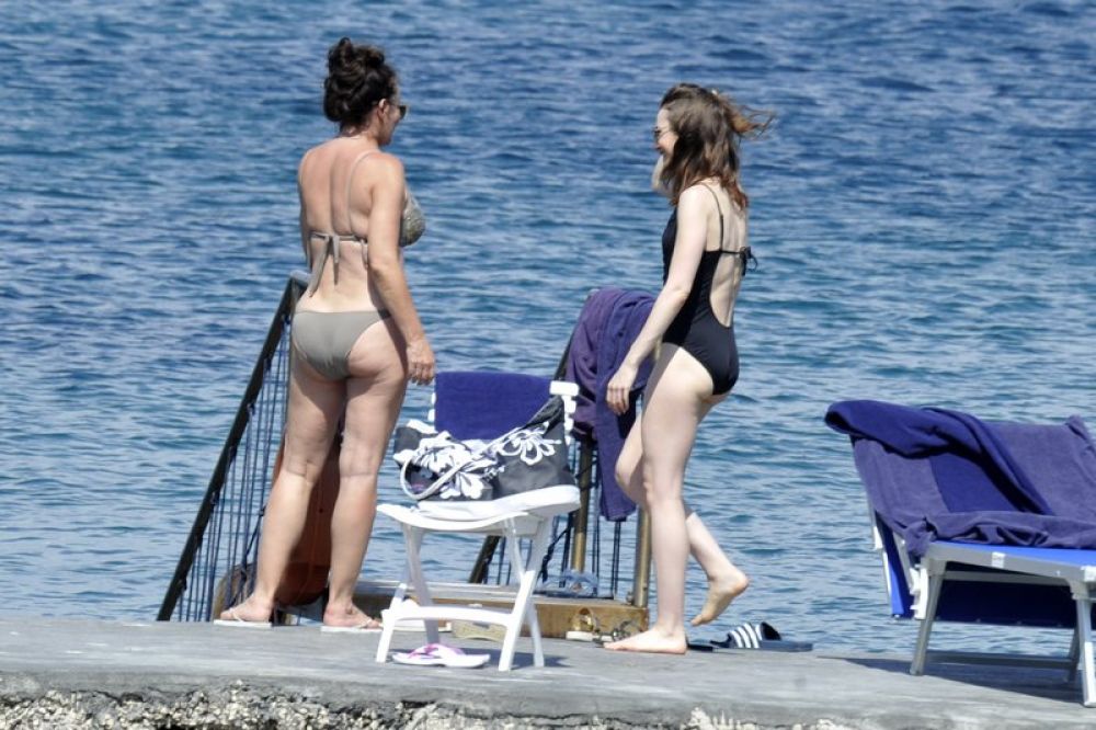 lily-collins-in-swimsuit-at-a-beach-in-ischia-07-15-2017_10.