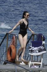 LILY COLLINS in Swimsuit at a Beach in Ischia 07/15/2017