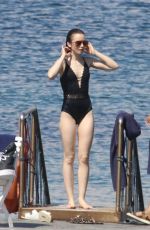 LILY COLLINS in Swimsuit at a Beach in Ischia 07/15/2017