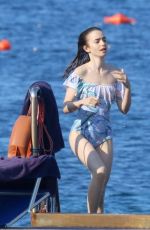 LILY COLLINS in Swimsuit at a Beach in Ischia 07/18/2017
