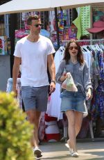 LILY COLLINS Out and About in Ischia 07/18/2017