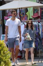 LILY COLLINS Out and About in Ischia 07/18/2017