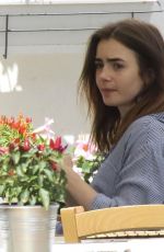 LILY COLLINS Out and About in Ischia 07/18/2017