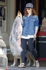 LILY COLLINS Picking up Her Dry Cleaning in Beverly Hills 07/08/2017