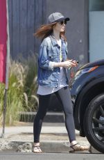 LILY COLLINS Picking up Her Dry Cleaning in Beverly Hills 07/08/2017