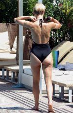 MICHELLE HUNZIKER in Swimsuit at a Pool in Milano Marittima 07/08/2017
