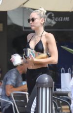 MILEY CYRUS in Bikini Top Out in Malibu 07/25/2017