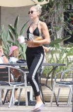 MILEY CYRUS in Bikini Top Out in Malibu 07/25/2017