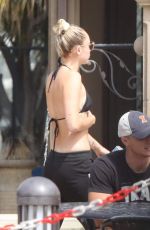 MILEY CYRUS in Bikini Top Out in Malibu 07/25/2017
