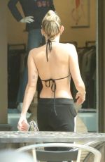 MILEY CYRUS in Bikini Top Out in Malibu 07/25/2017