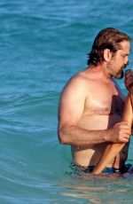 MORGAN BROWN adn Gerrard Butler at a Beach in Tulum 07/01/2017