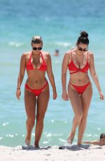 NATASHA OAKLEY and DEVIN BRUGMAN in Bikinis at a Beach in Miami 07/18/2017