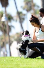 NINA DOBREV with Her Puppy at a Local Park in Los Angeles 07/05/2017
