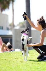 NINA DOBREV with Her Puppy at a Local Park in Los Angeles 07/05/2017