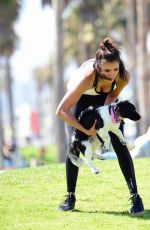 NINA DOBREV with Her Puppy at a Local Park in Los Angeles 07/05/2017