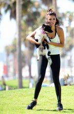 NINA DOBREV with Her Puppy at a Local Park in Los Angeles 07/05/2017