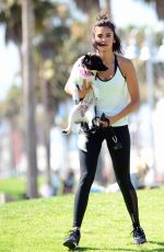NINA DOBREV with Her Puppy at a Local Park in Los Angeles 07/05/2017